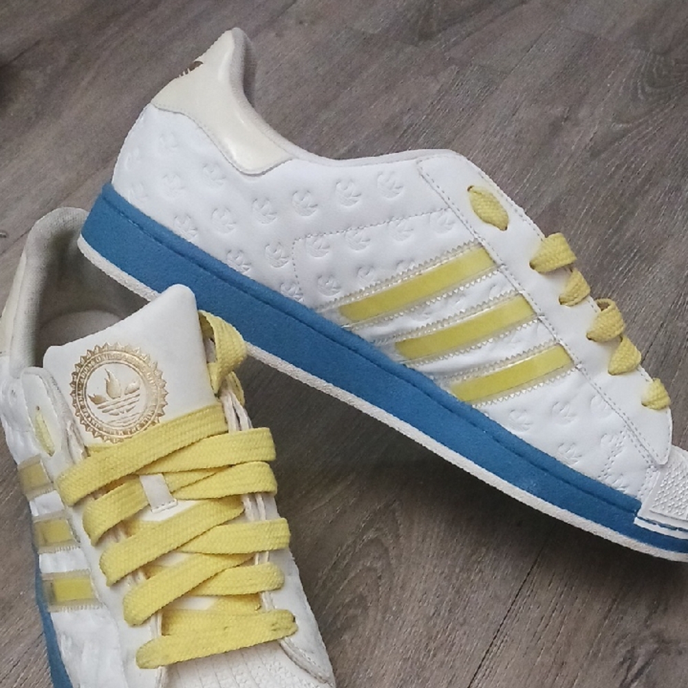 Adidas MENS White, Yellow, and Blue Sneakers
